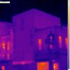 An infrared camera shows how little heat escapes the walls of the new building on Grand Street